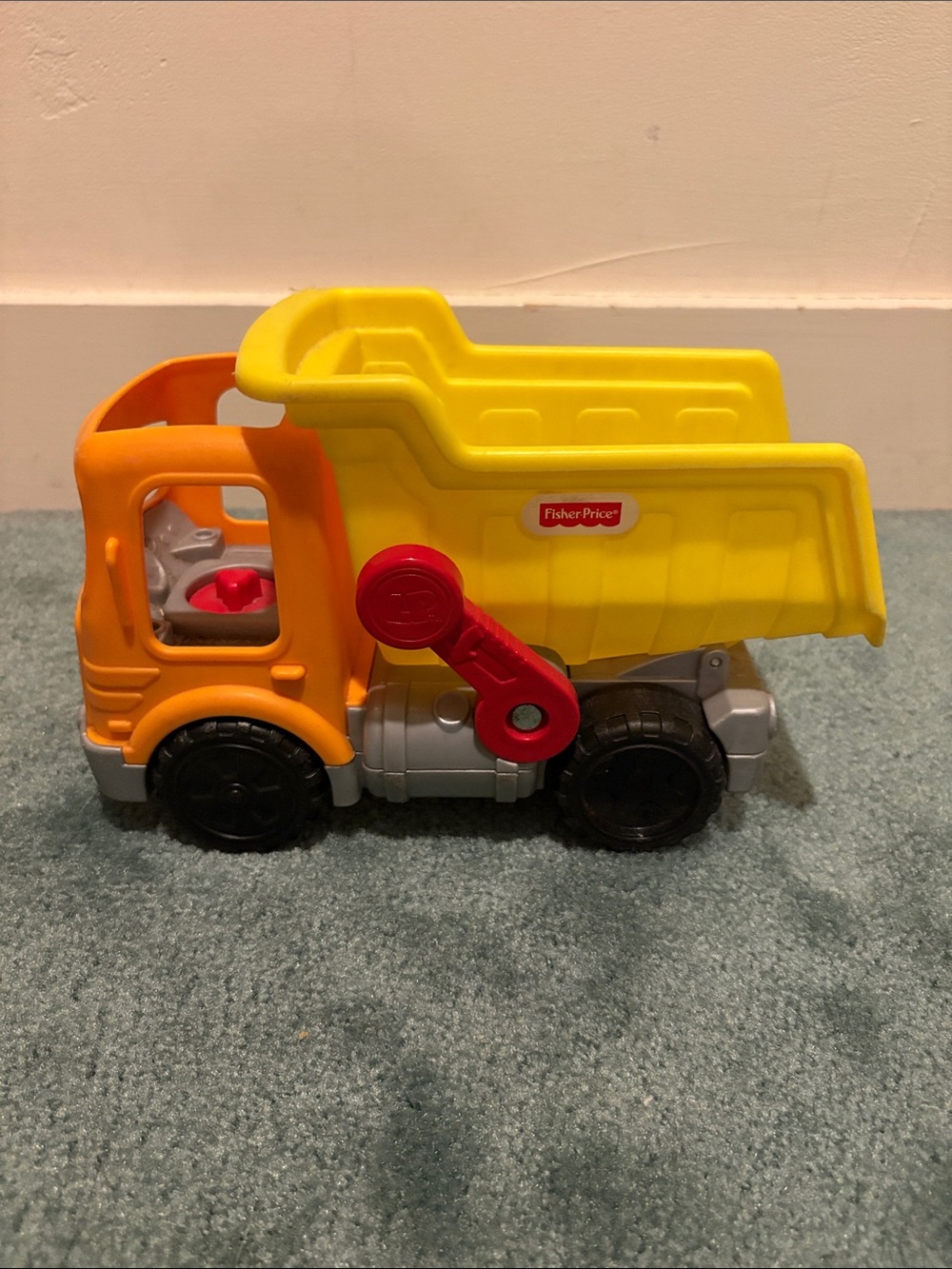 Fisher-Price Yellow & Orange Plastic Dump Truck with Red Lever